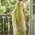 Lime green cotton silk blend saree with intricate woven border