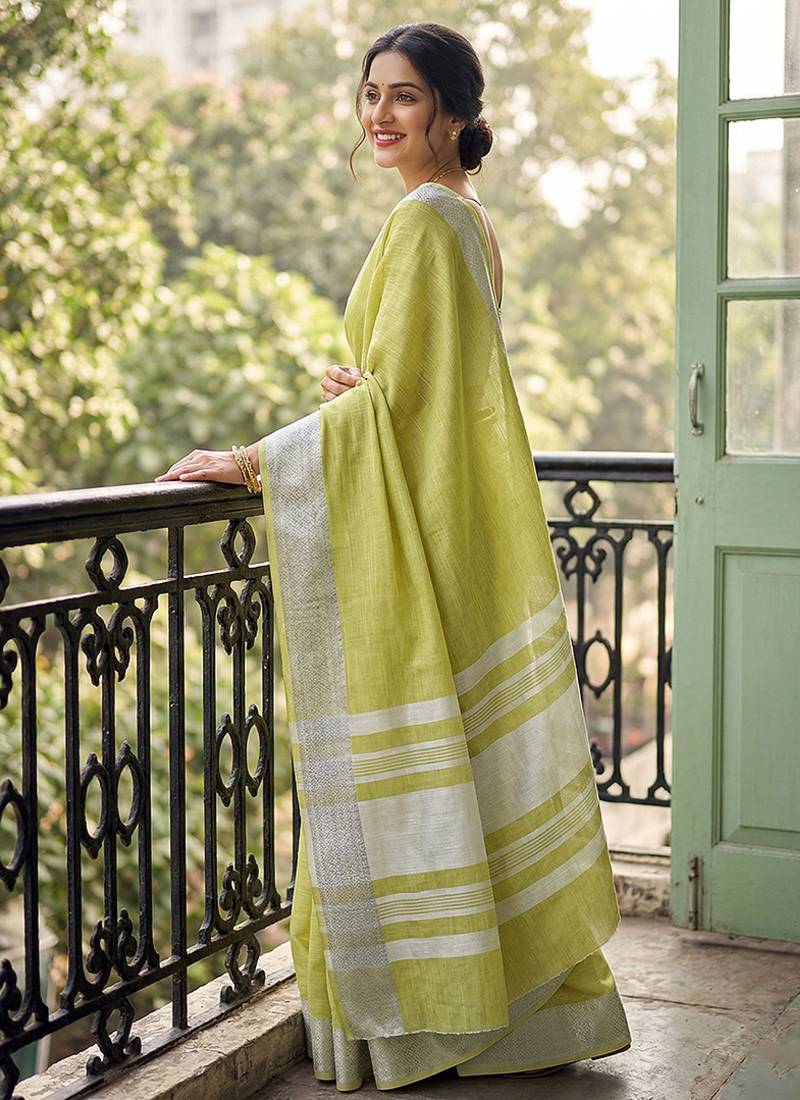 Lime green cotton silk blend saree with intricate woven border