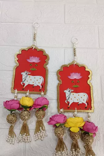 handmade cow mdf door hanging with artificial flowers traditional festive decoration pack of 2