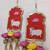 handmade cow mdf door hanging with artificial flowers traditional festive decoration pack of 2