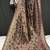 brown color kalamkari fusion print contemporary silk blend saree  