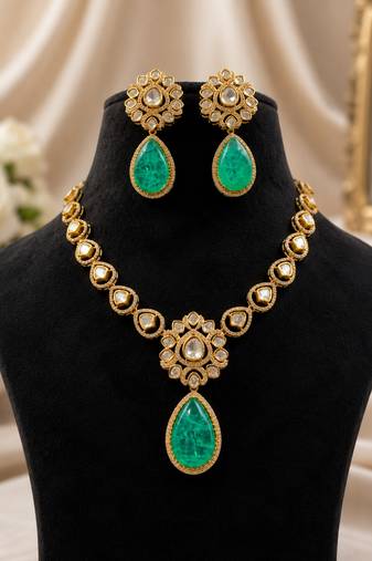 Gold plated green emerald style kundan necklace set with teardrop pendant & matching earrings  jewellery set