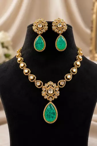 Gold plated green emerald style kundan necklace set with teardrop pendant & matching earrings  jewellery set