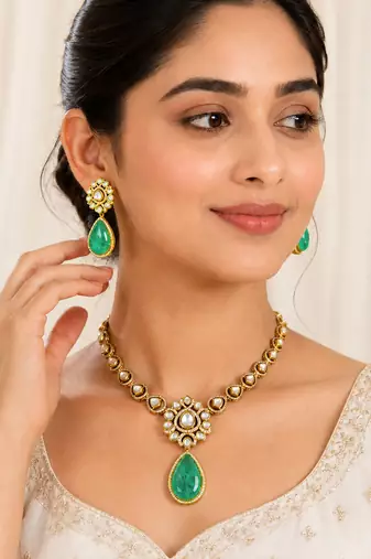 Gold plated green emerald style kundan necklace set with teardrop pendant & matching earrings  jewellery set