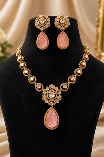Elegant pink stone kundan style necklace set with matching earrings | gold tone bridal jewellery