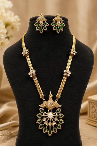 Elegant green kundan style long necklace set with peacock pendant & matching earrings