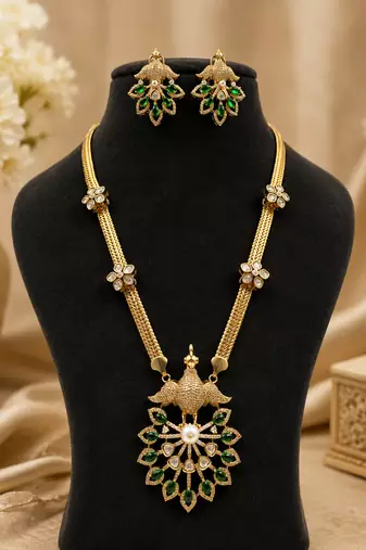 Elegant green kundan style long necklace set with peacock pendant & matching earrings