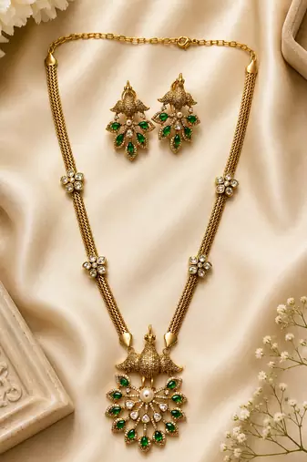 Elegant green kundan style long necklace set with peacock pendant & matching earrings