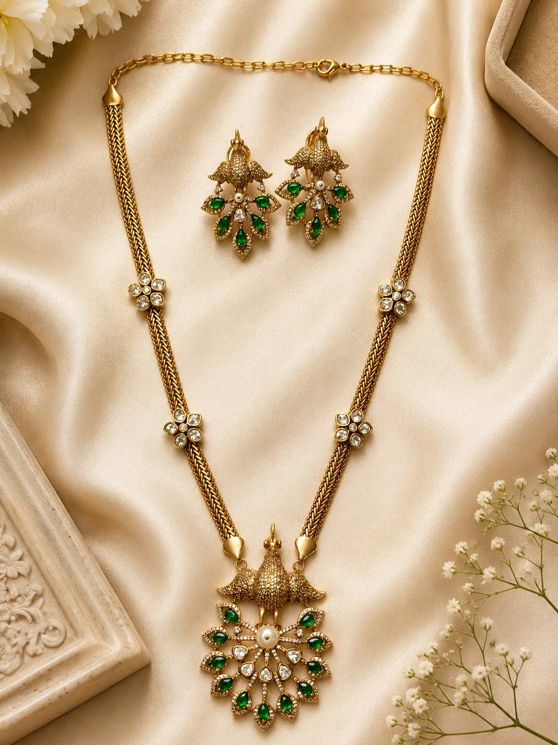 Elegant green kundan style long necklace set with peacock pendant & matching earrings