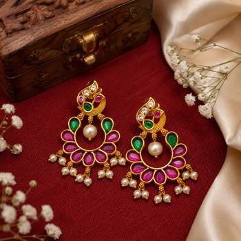 Gold plated peacock chandbali earrings with pink green stones & pearl drops 1