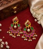 Gold plated peacock chandbali earrings with pink green stones & pearl drops