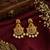 Gold plated designer chandbali earrings with ruby green stones & pearl drops