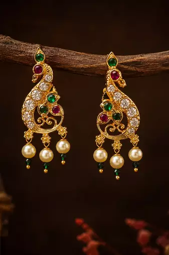 Gold plated peacock designer earrings with ruby green stones & pearl drops