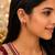 Gold plated ruby stone floral stud earrings | south indian temple style jewelry