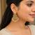 Gold plated ruby green designer earrings with pearl drops | traditional ethnic jewelry