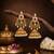 Traditional south indian gold plated jhumka earrings with green stones & pearl drops