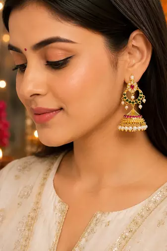 Traditional south indian gold plated jhumka earrings with green stones & pearl drops