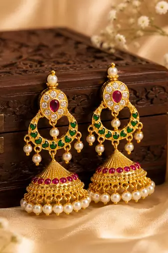 Traditional south indian gold plated jhumka earrings with green stones & pearl drops