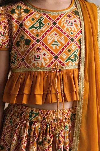 Vastramay Girls Mustard Patola Print Cotton Lehenga Choli with Dupatta