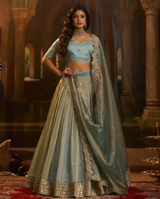Turquoise Organza Lehenga with Intricate Zari & Sequin Embroidery 1