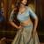 Turquoise Organza Lehenga with Intricate Zari & Sequin Embroidery