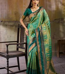 Sea green pochampally silk blend handloom saree with zari border
