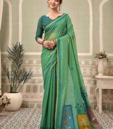 Sea green cotton blend floral printed saree