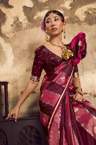 Wine banarasi satin silk blend saree with zari woven border and pallu
