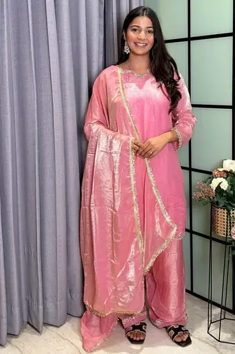 peach color mirror and moti embellished lace border silk blend kurti pant set