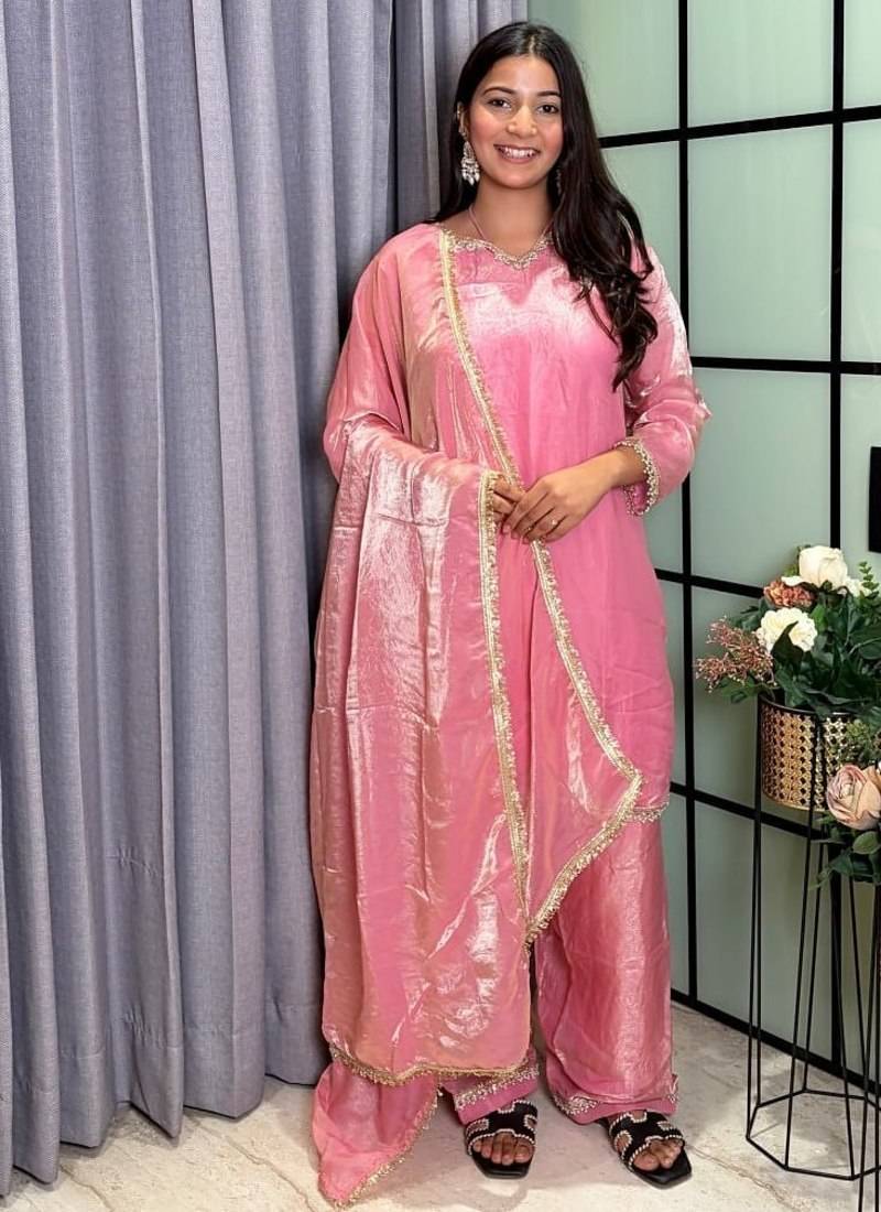 peach color mirror and moti embellished lace border silk blend kurti pant set