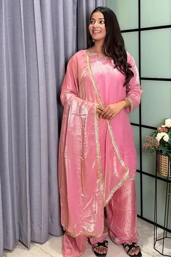 peach color mirror and moti embellished lace border silk blend kurti pant set