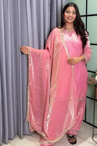 peach color mirror and moti embellished lace border silk blend kurti pant set