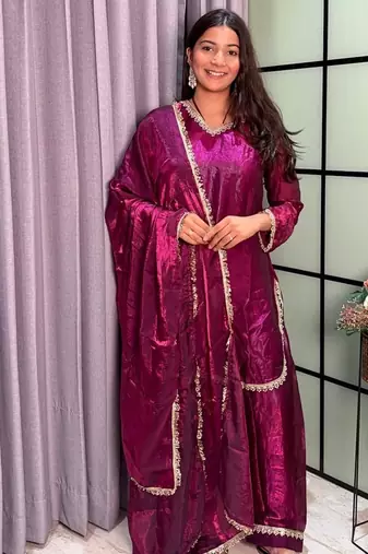 plum color mirror and moti embellished lace border silk blend kurti pant set