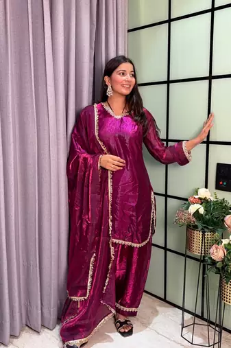plum color mirror and moti embellished lace border silk blend kurti pant set
