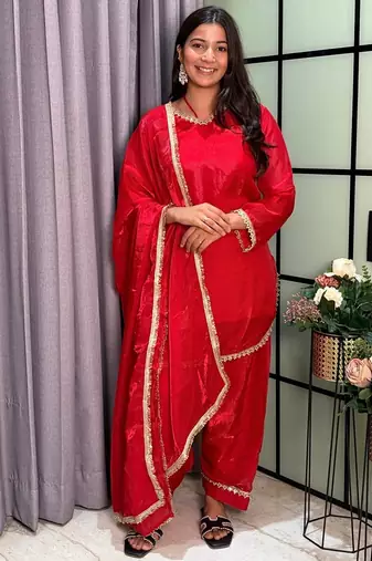red color mirror and moti embellished lace border silk blend kurti pant set