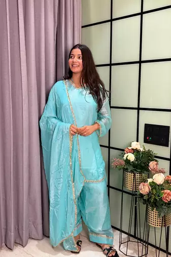 sky blue color mirror and moti embellished lace border silk blend kurti pant set