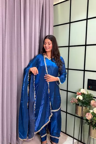 teal color mirror and moti embellished lace border silk blend kurti pant set
