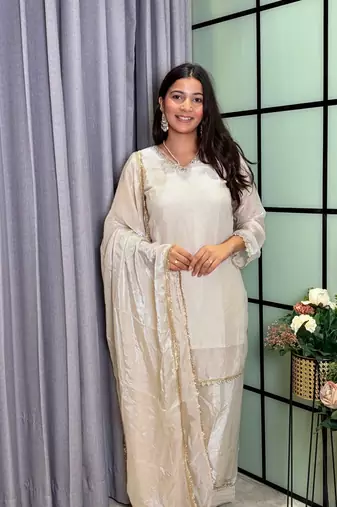 white color mirror and moti embellished lace border silk blend kurti pant set