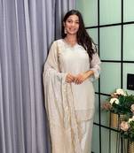 white color mirror and moti embellished lace border silk blend kurti pant set