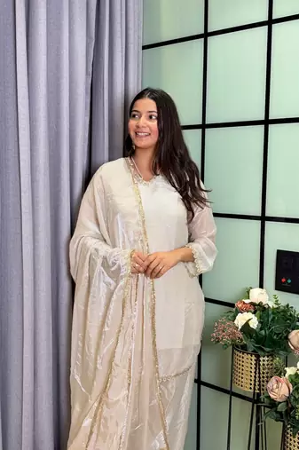 white color mirror and moti embellished lace border silk blend kurti pant set