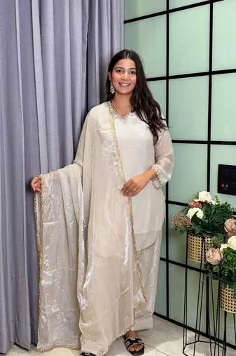 white color mirror and moti embellished lace border silk blend kurti pant set