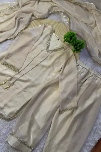 white color mirror and moti embellished lace border silk blend kurti pant set