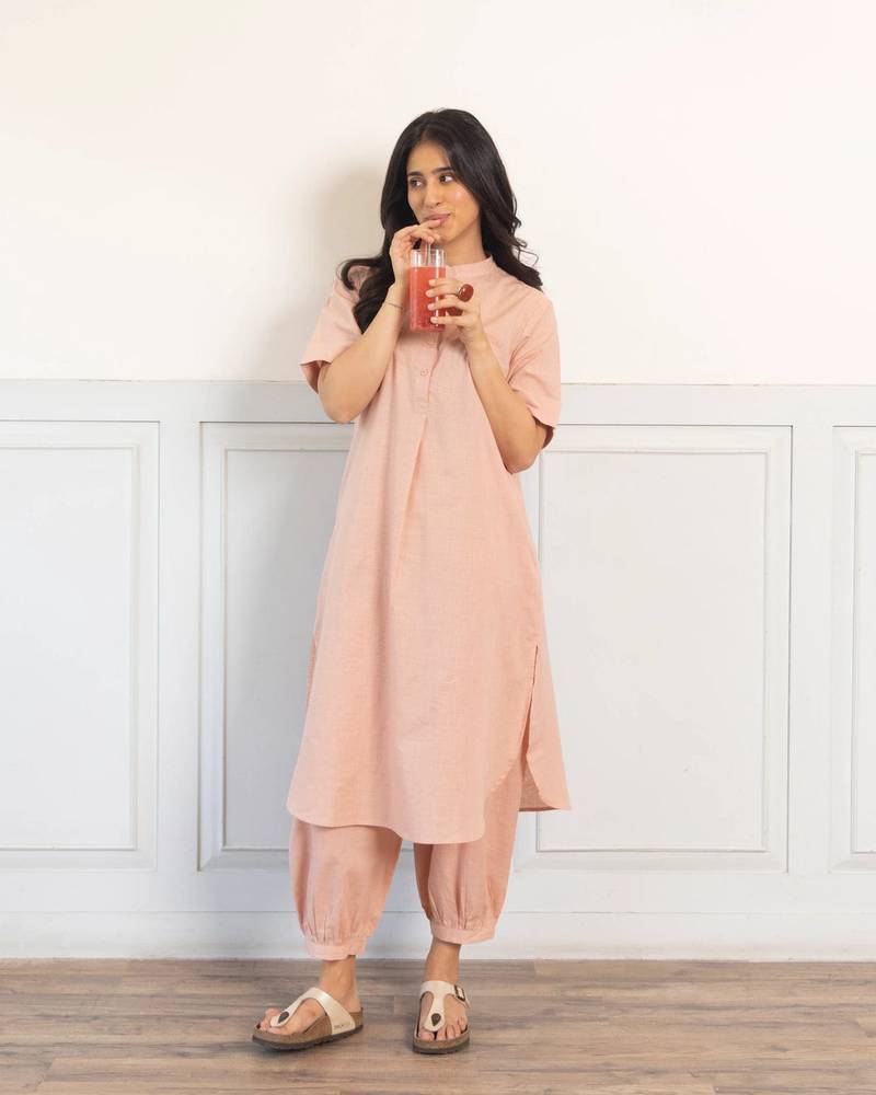 Women's Solid Peach Kurta and Pants Set with Mandarin Collar