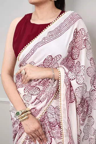 printed satin saree with elegant pearl lace border