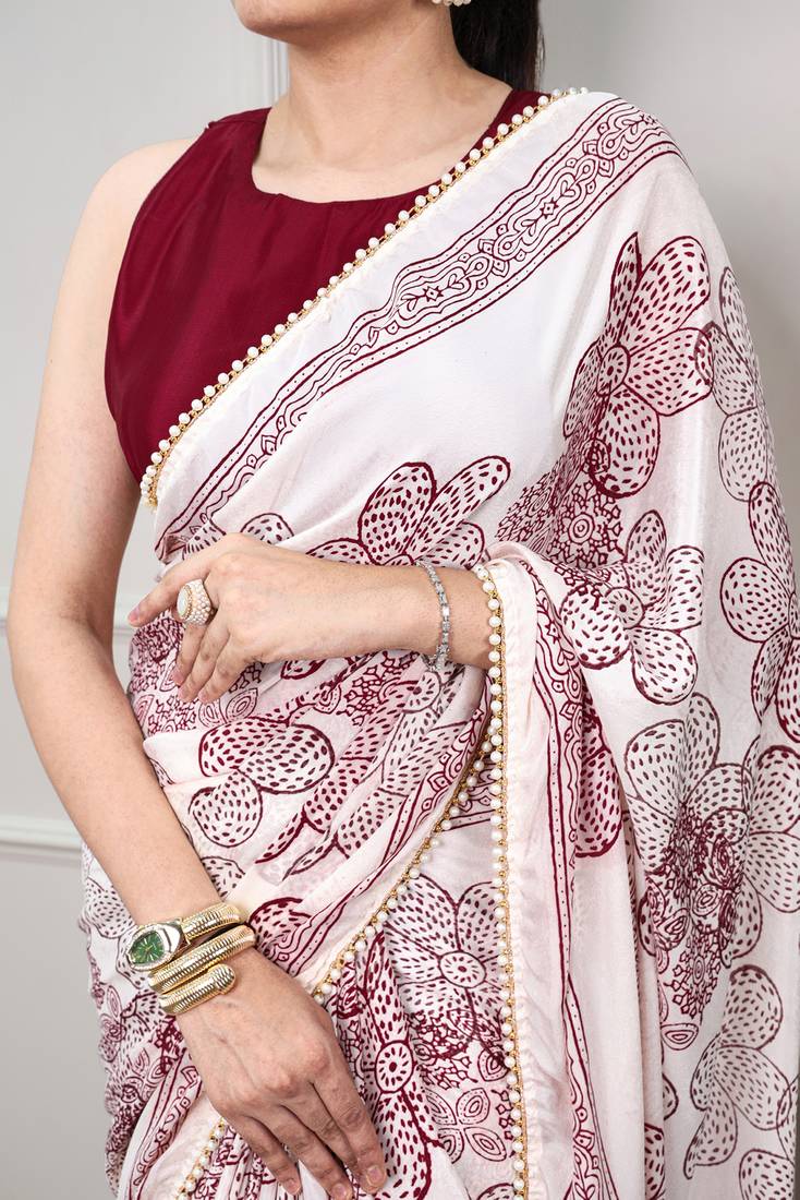 printed satin saree with elegant pearl lace border