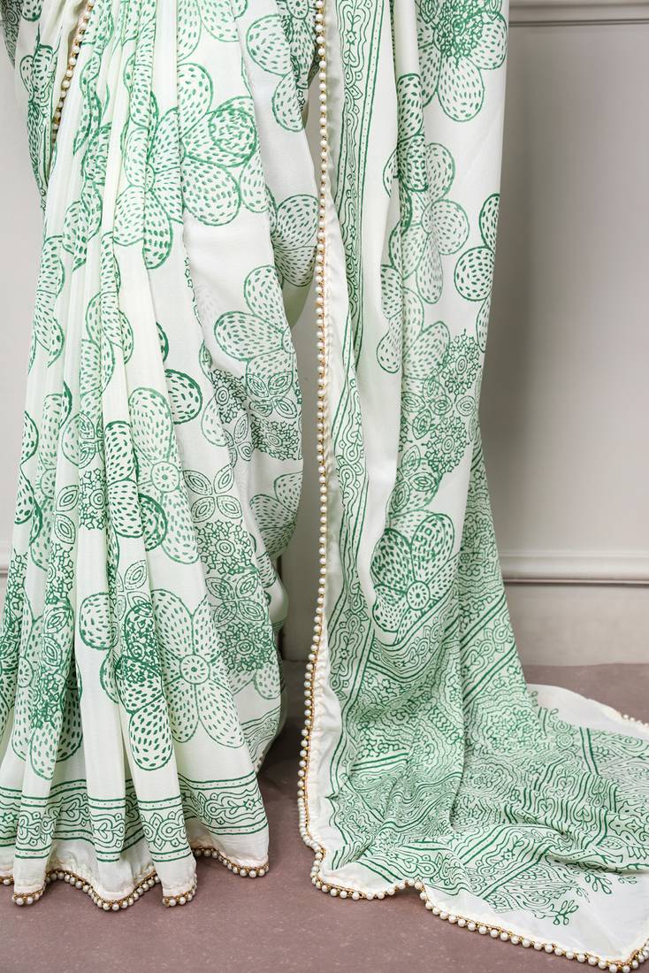 printed satin saree with elegant pearl lace border