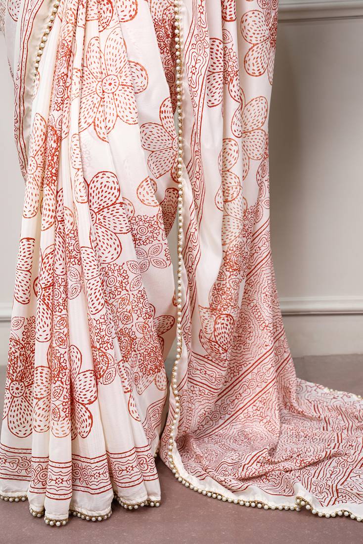 printed satin saree with elegant pearl lace border