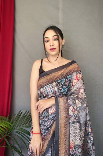 black color kashmiri digital print with contrast kashmiri and floral conceptual printed border cotton blend sarees