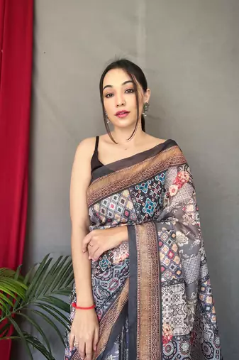 black color kashmiri digital print with contrast kashmiri and floral conceptual printed border cotton blend sarees