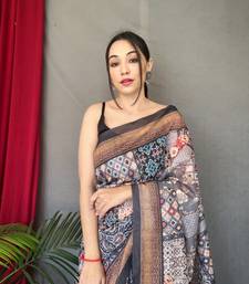 black color kashmiri digital print with contrast kashmiri and floral conceptual printed border cotton blend sarees